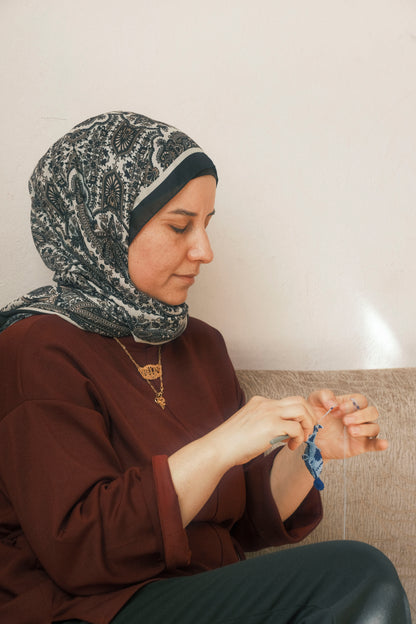 Blue Mackarel fish keychain handmade by Syrian refugee women in Istanbul, Turkey