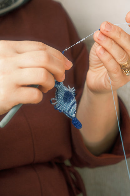 Blue Mackarel fish keychain handmade by Syrian refugee women in Istanbul, Turkey