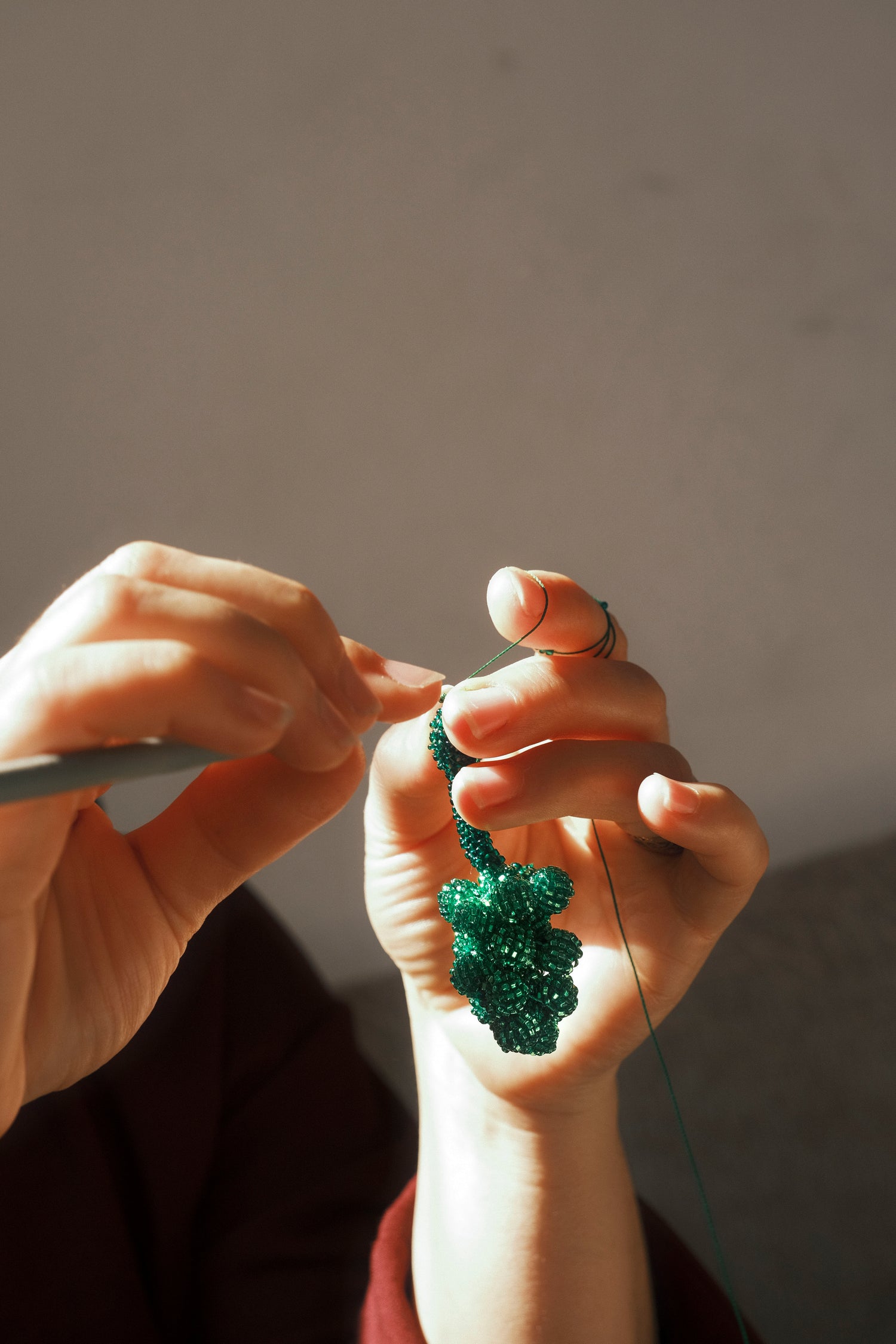 Grape keychain handmade by Syrian refugee women in Istanbul, Turkey